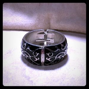 Silver and black metal bangle